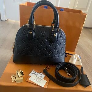 Louis Vuitton
Monogram Empreinte Neo Alma BB